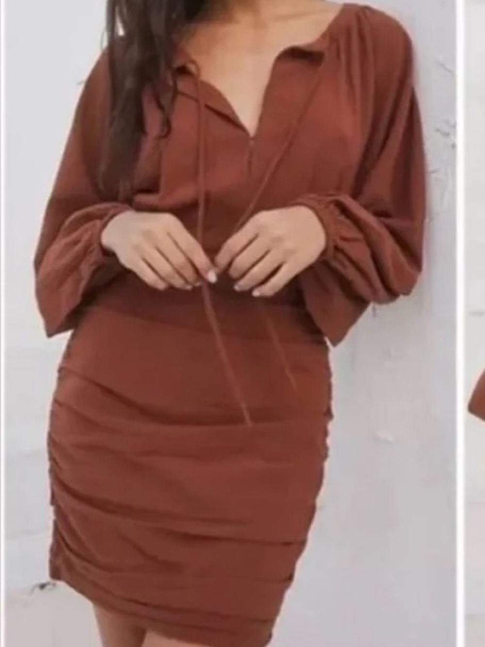 Free People One and Only Mini Dress in Tangelo and Plum.
Long Sleeve Ruched